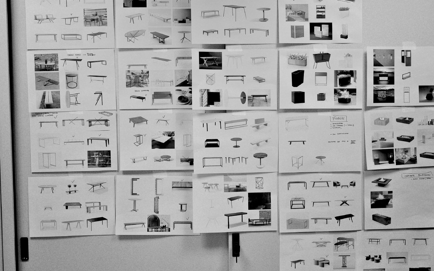 Hundreds of sheet sticked to a wall to share individual researches and get new input